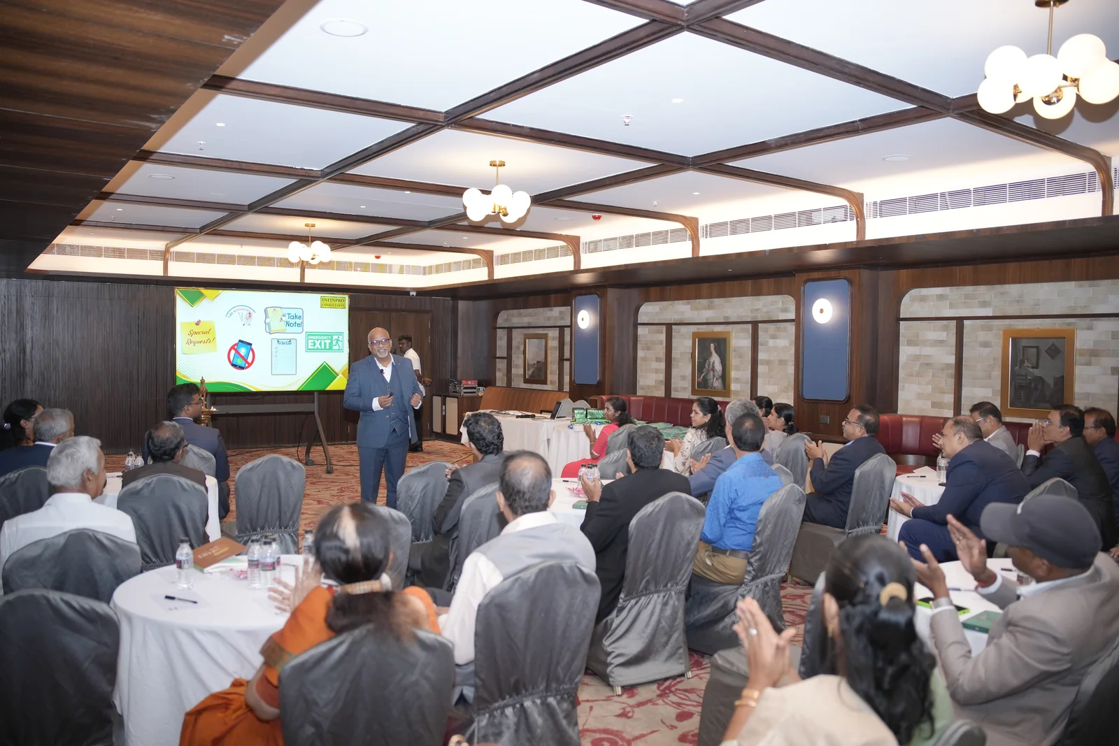 A speaker addressing advisers and entrepreneurs at the Leadership Summit