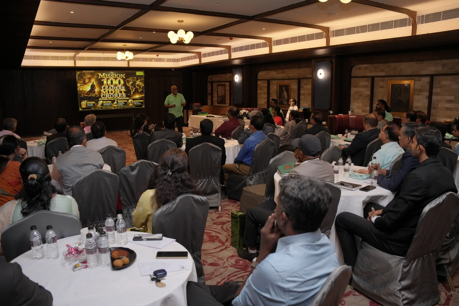 The MDRT Summit audience watching a presentation